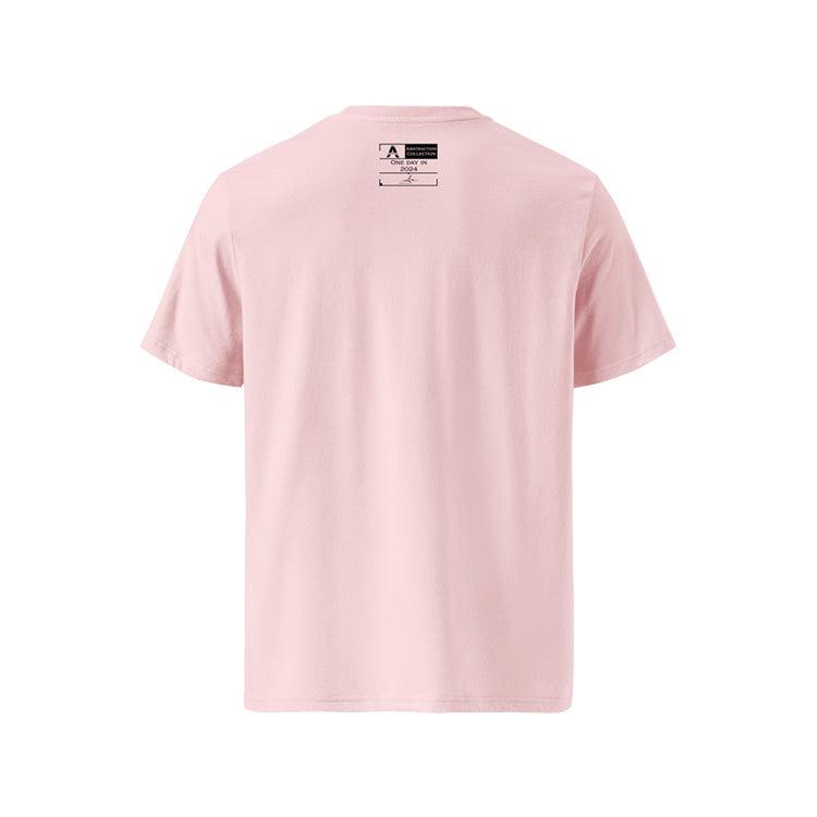 T-shirt unisexe rose, vu de dos et portant l'étiquette de la collection "Abstraction" coloré en noir